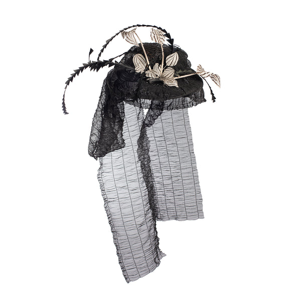 Fascinator mit Federn und Schleier in Schwarz und Weiß